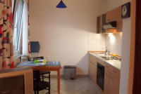 Cooking area with dining table